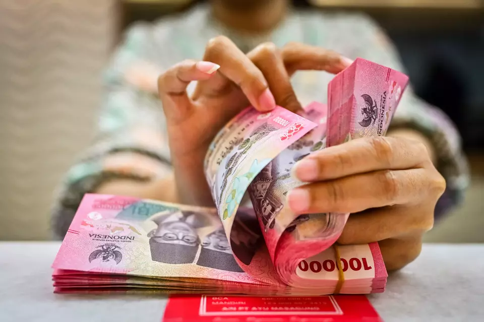 Nilai Tukar Rupiah Hari Ini Turun 23 Poin: Apa Sebabnya?