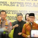 Menteri P2MI dan Kapolri Teken MoU Perkuat Perlindungan Pekerja Migran Indonesia